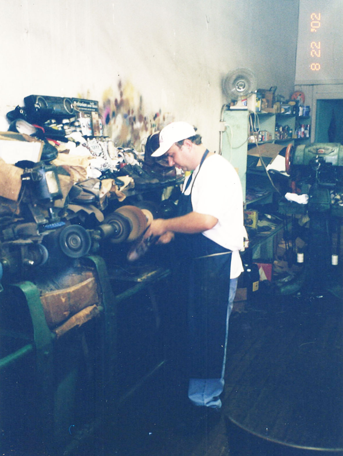 Tommy Garner working at John's Shoe Hospital